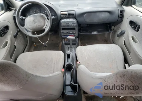 1999 Saturn Sl1 from USA, damaged, VIN 1G8ZH5284XZ187243